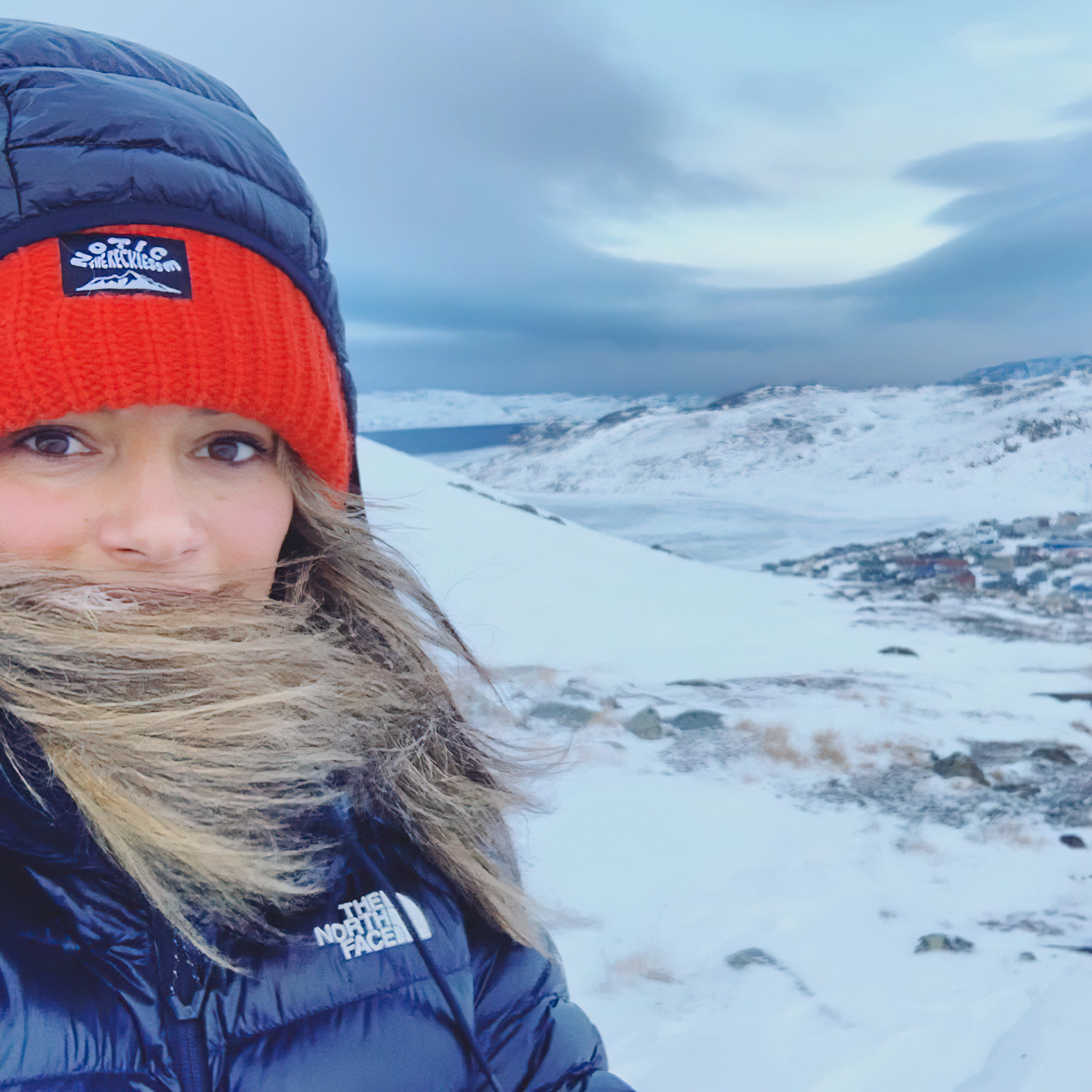 Person in snowy landscape, winter attire