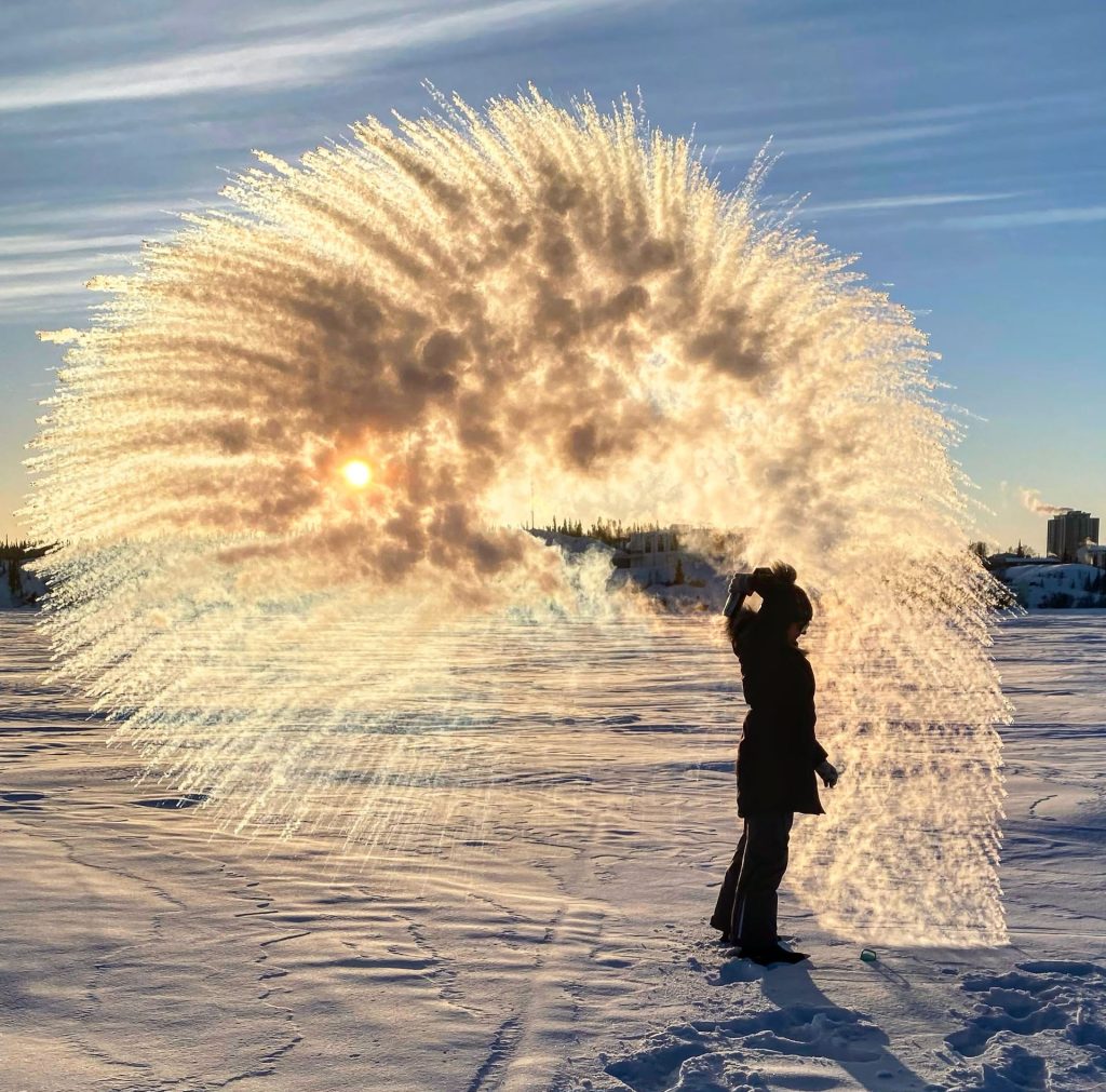 Person creating steam in winter