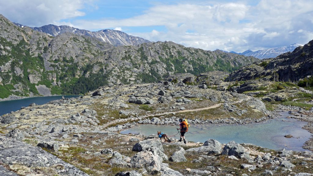 Scenic mountain landscape with hikers.