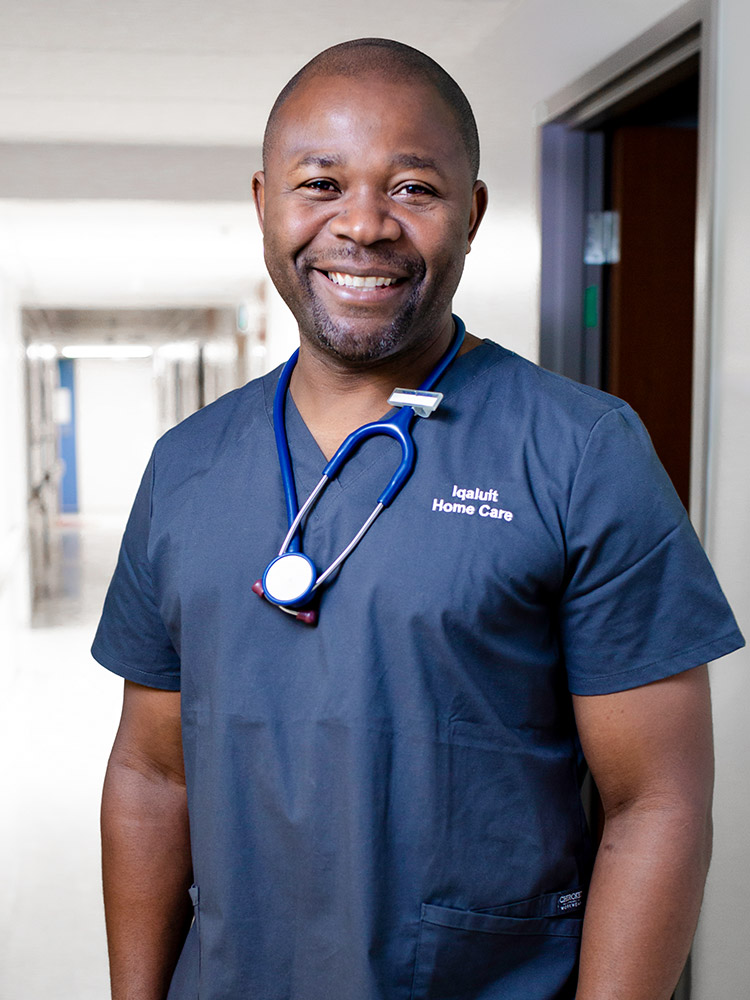 Smiling healthcare professional in scrubs