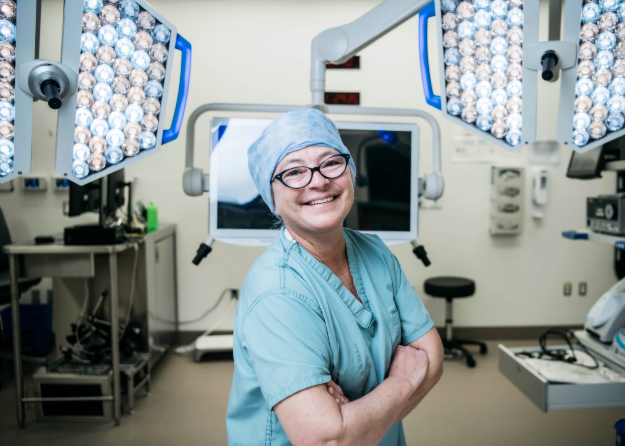 Smiling surgeon in operating room
