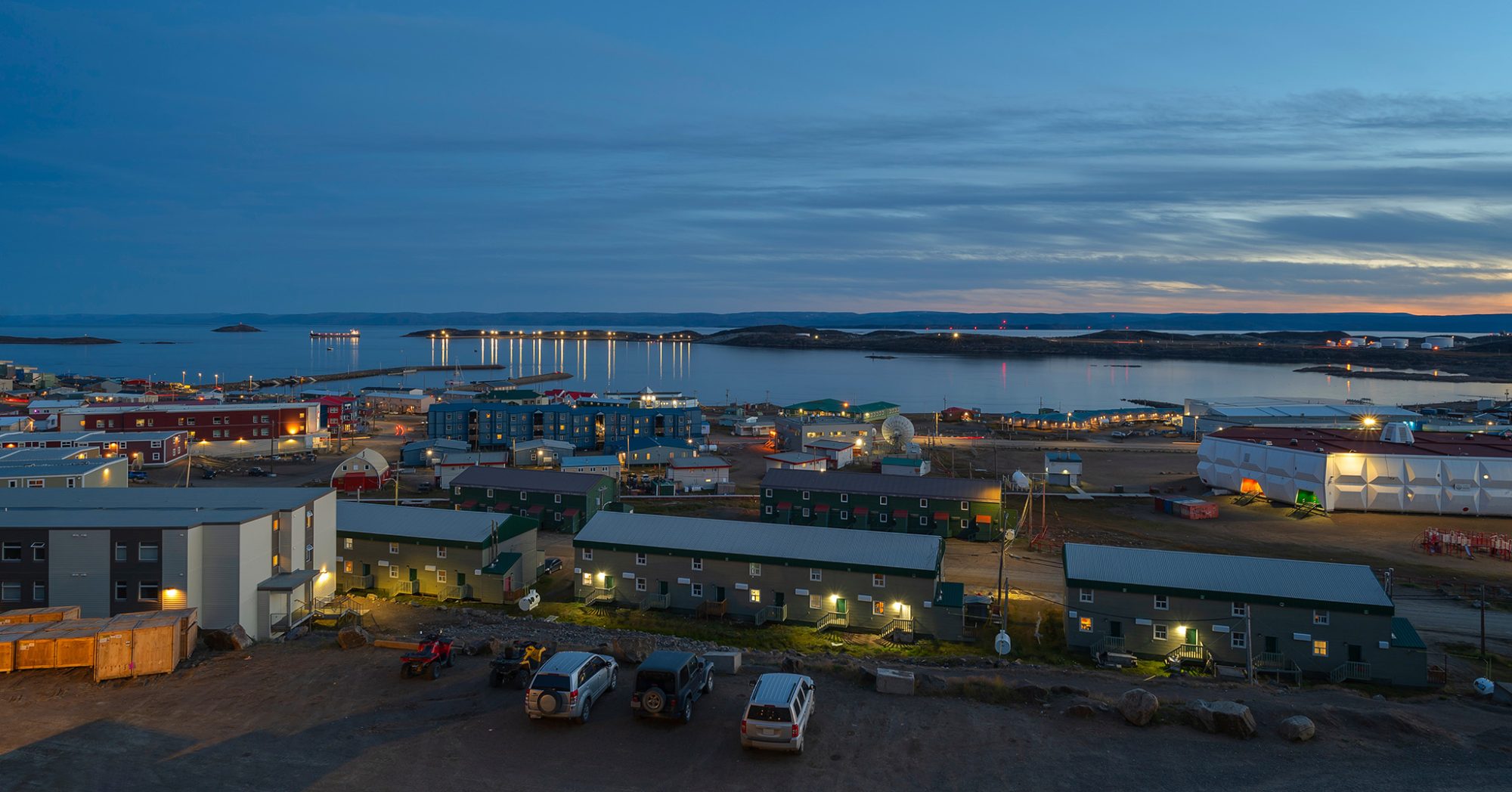 Quiet coastal town at twilight.