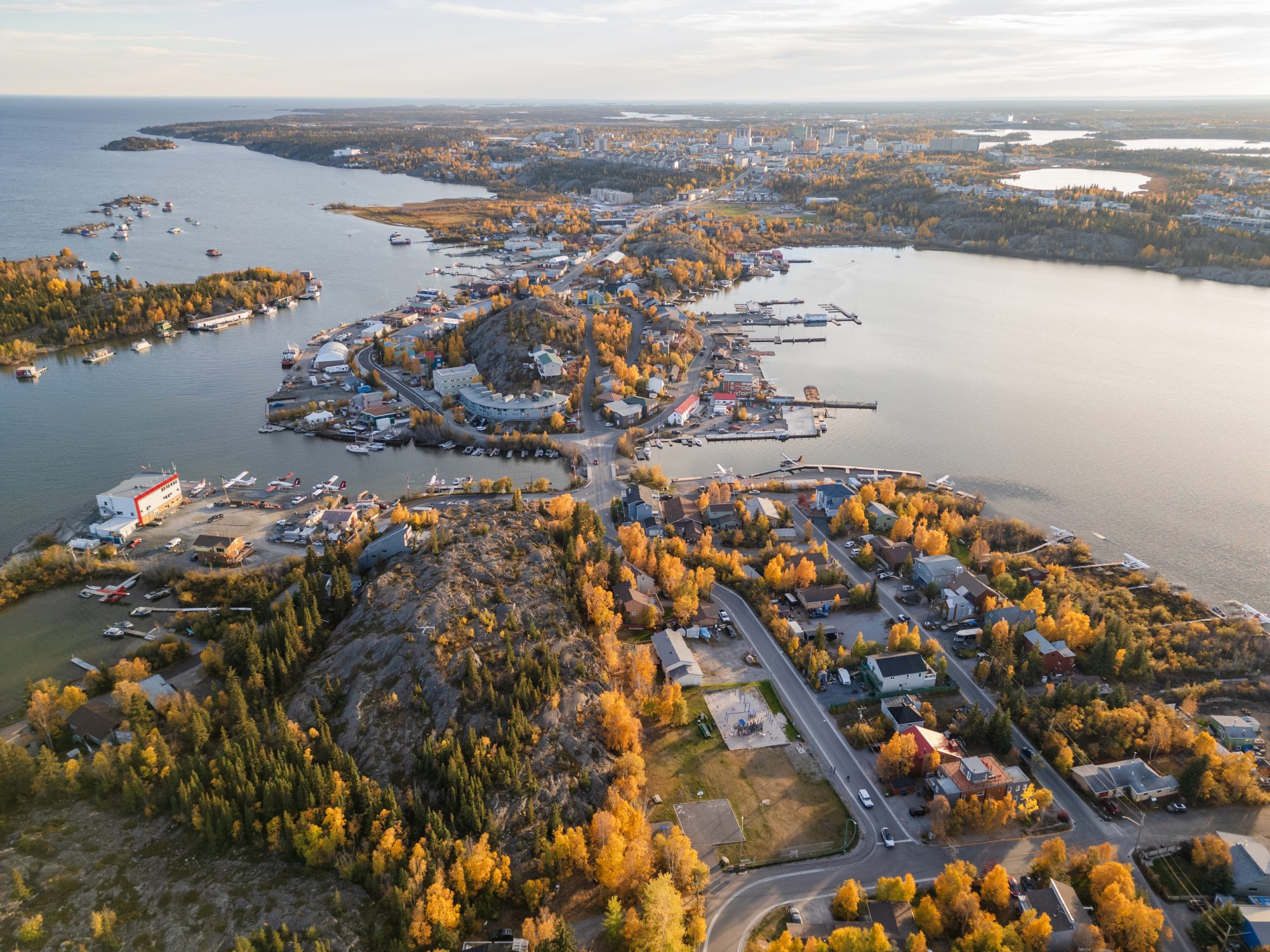 Aerial view of autumnal waterfront town.